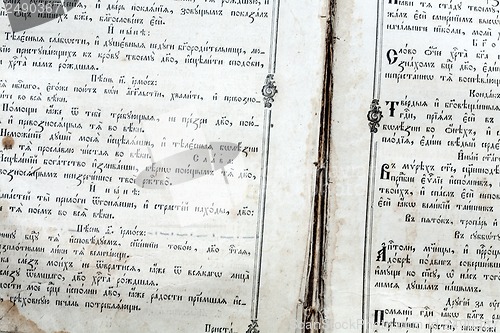 Image of Macro close-up of a scripture in a very old Bible.