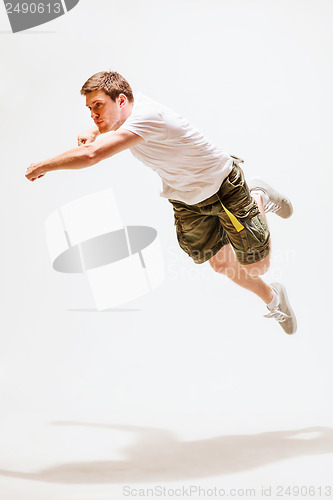 Image of male dancer jumping in the air