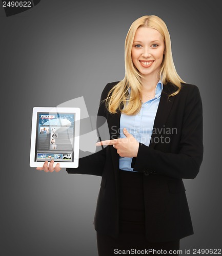 Image of woman showing tablet pc with news