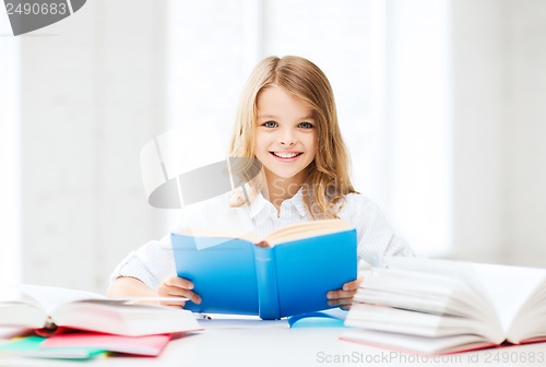 Image of student girl studying at school