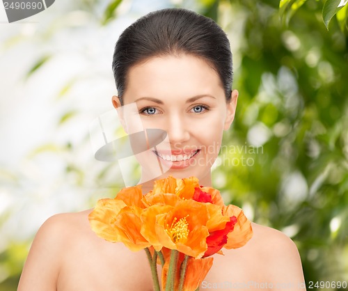 Image of young woman with bouquet of flowers