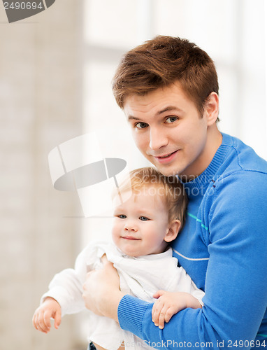 Image of happy father with adorable baby