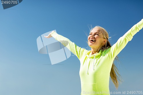 Image of woman doing sports outdoors