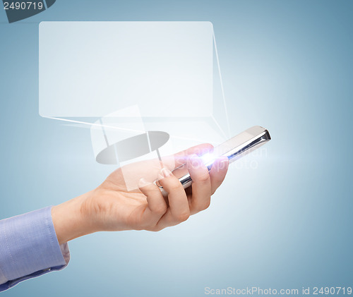 Image of man hand with smartphone and virtual screen