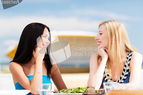 Image of girls in cafe on the beach