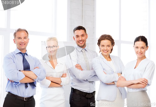 Image of happy business team in office