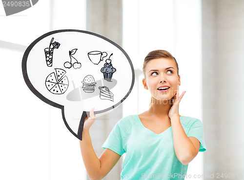 Image of girl showing text bubble with junk food icons