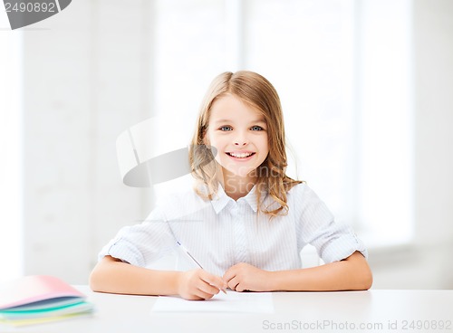 Image of student girl studying at school