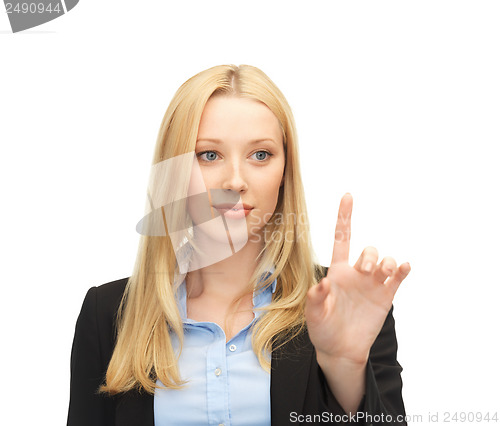 Image of businesswoman working with something imaginary