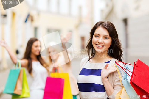 Image of girls with shopping bags in ctiy