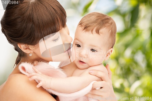 Image of happy mother with adorable baby