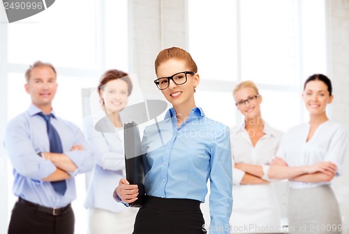 Image of businesswoman with tablet pc in office