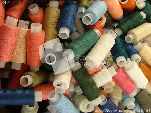 Image of pile of rolls of threads