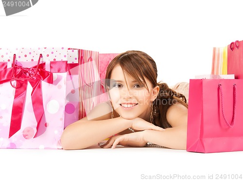 Image of girl with color gift bags