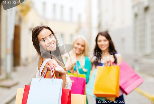 Image of girls with shopping bags in ctiy