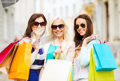 Image of girls with shopping bags in ctiy