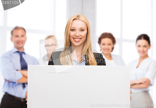 Image of businesswoman with white blank board