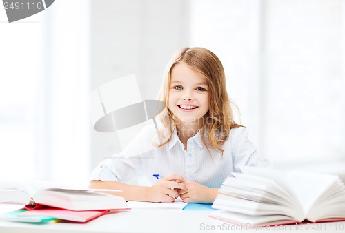 Image of student girl studying at school