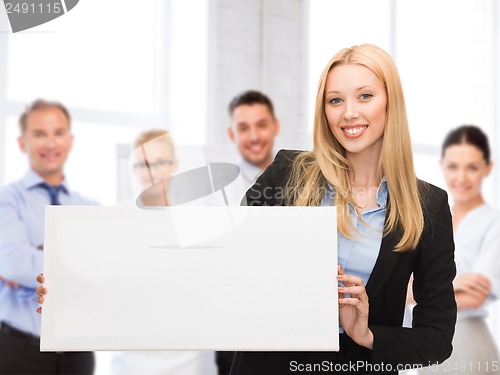 Image of businesswoman with white blank board