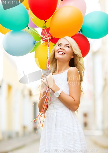 Image of woman with colorful balloons