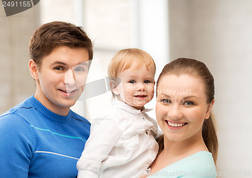 Image of happy family with adorable baby