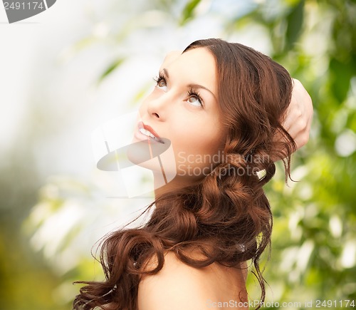 Image of beautiful woman on nature