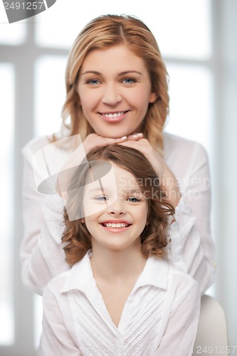 Image of happy mother and daughter