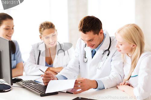 Image of young team or group of doctors on meeting