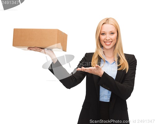 Image of businesswoman holding cardboard box