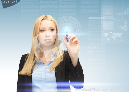 Image of businesswoman working with virtual screen