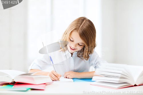 Image of student girl studying at school