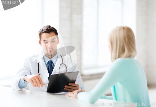 Image of doctor with patient in hospital