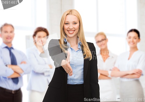 Image of woman with an open hand ready for handshake