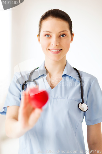 Image of female doctor with heart