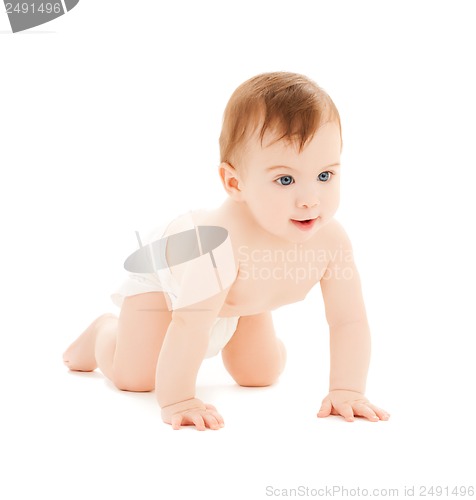 Image of crawling curious baby