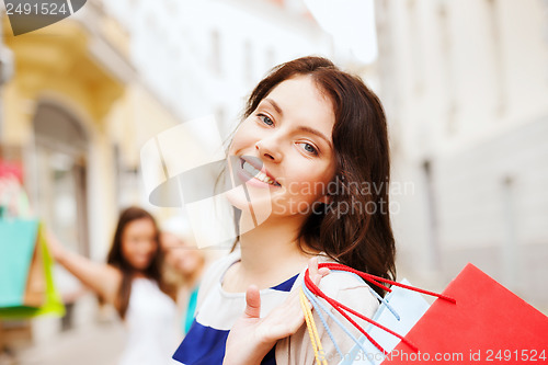 Image of girls with shopping bags in ctiy