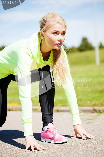 Image of woman doing running outdoors