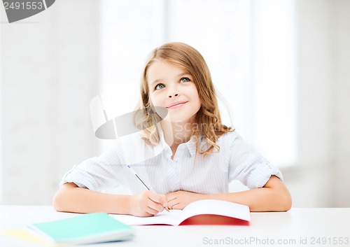 Image of student girl studying at school
