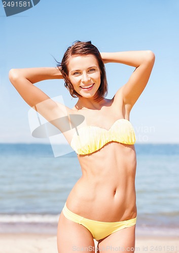 Image of girl posing on the beach