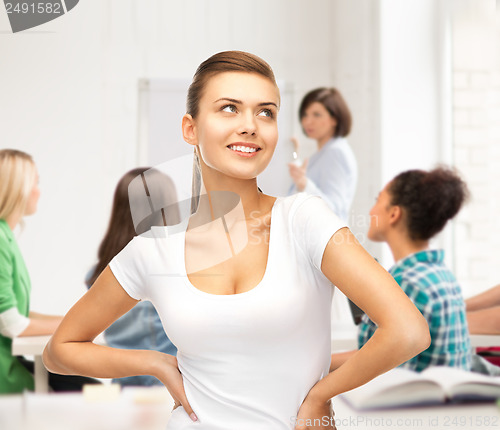 Image of student girl in blank white t-shirt at school