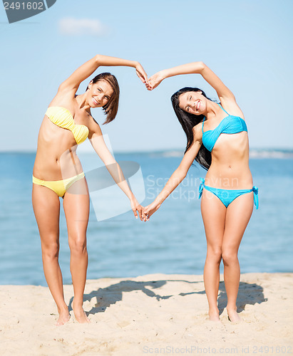 Image of girls having fun on the beach