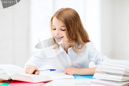 Image of student girl studying at school