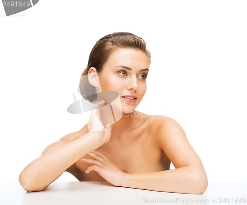 Image of face of woman with clean perfect skin