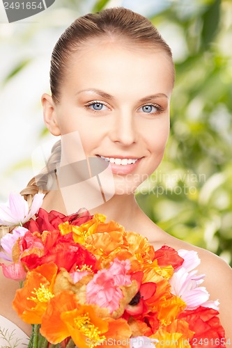 Image of young woman with bouquet of flowers