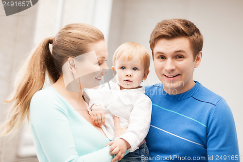 Image of happy family with adorable baby