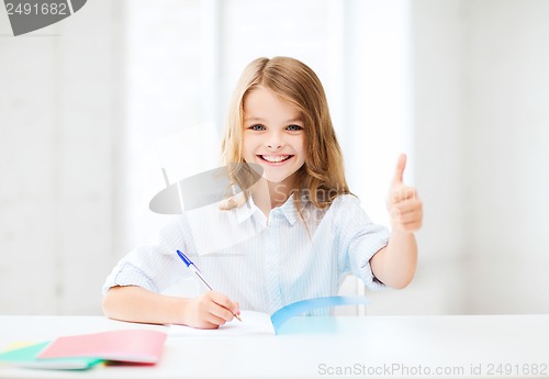 Image of student girl studying at school