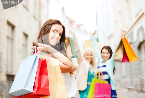 Image of girls with shopping bags in ctiy