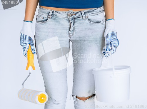 Image of woman with roller and paint pot