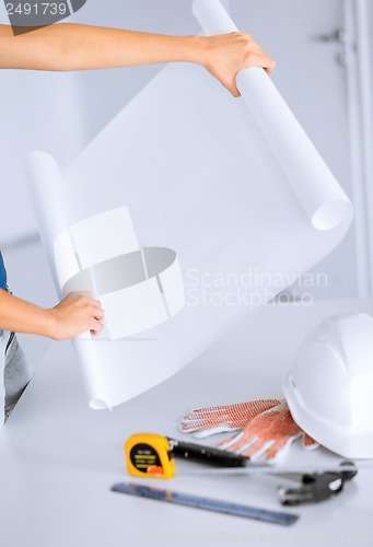 Image of architect with blank blueprint