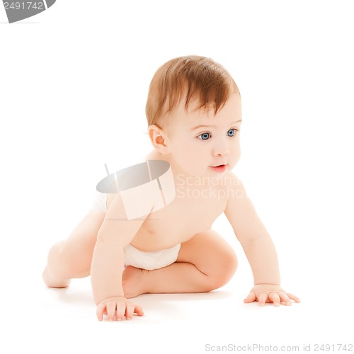 Image of crawling curious baby